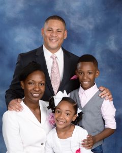 Pastor Robert Hill, pictured with his wife, Denise, and children, Robert Jr. and Elise, brings many years of experience to his new ministry in Denver, Colorado.