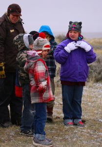 Worland students bundled up against the weather to spend time outdoors learning about wild horses in their area.