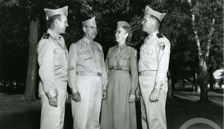 Arlene Church Seitz with senior officers at Camp Doss in the 1950s.