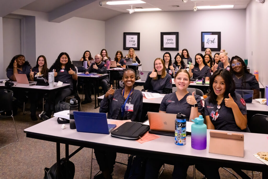 Photo of nursing students sitting in class.