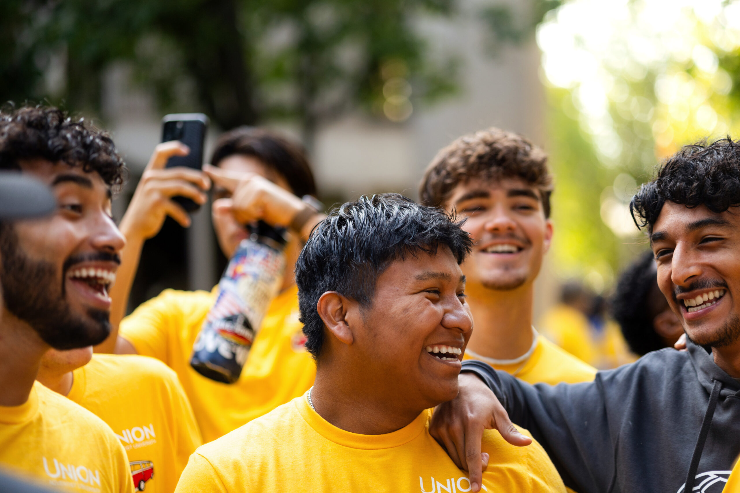 Photo of students laughing together.